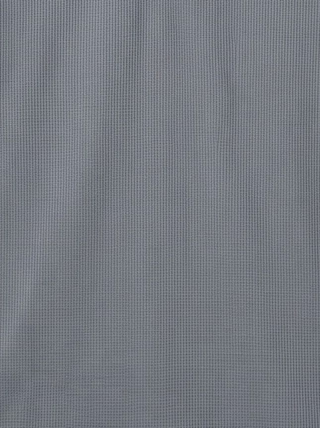 Close-up of slate waffle knit finish